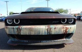 Illustration for article titled This Rust-Wrapped Dodge Challenger SRT Hellcat Is Making Me Have a True Existential Debate